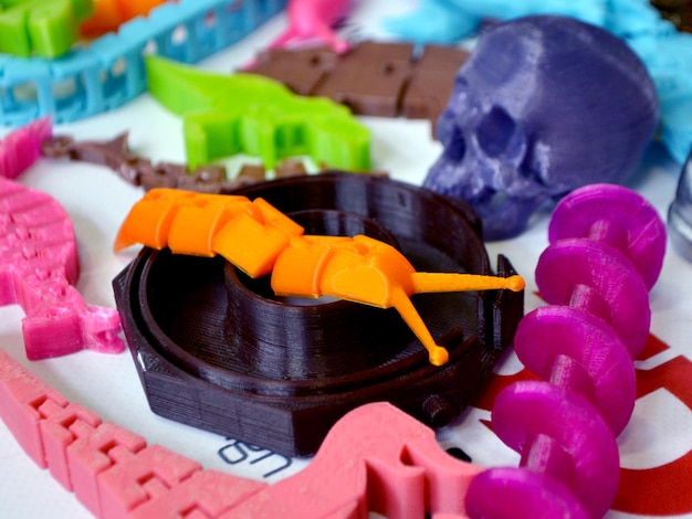 Models printed by 3d printer Bright colorful objects printed on a 3d printer