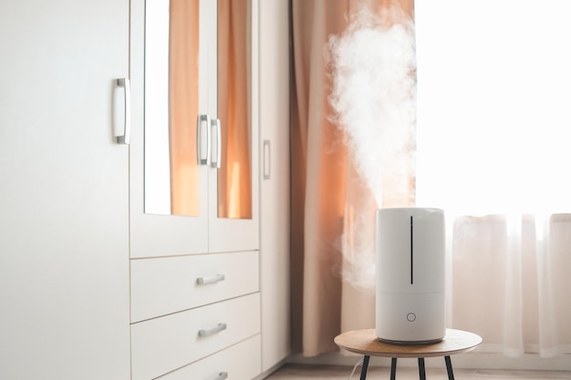 Photo modern air humidifier on table in living room space for text