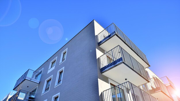 Modern apartment building in sunny day exterior residential house facade residential area