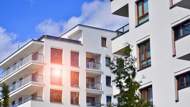 Modern apartment building in sunny day Exterior residential house facade