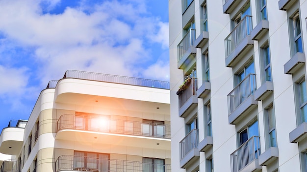 Modern apartment building in sunny day Exterior residential house facade