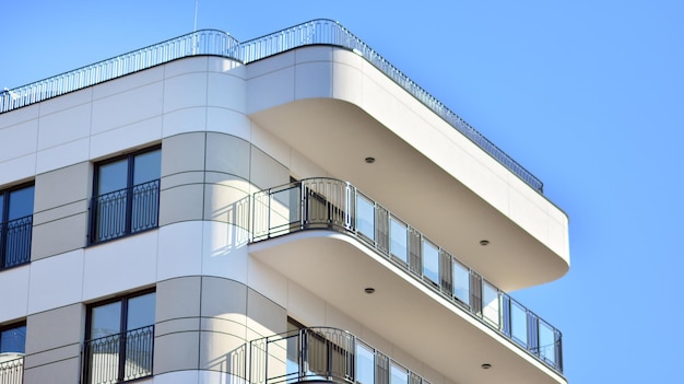 Modern apartment building on a sunny day with a blue sky Facade of a modern apartment building