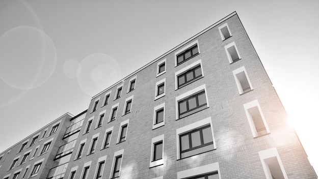 Modern apartment buildings on a sunny day Facade of a modern residential building Black and white