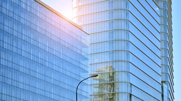 Modern apartment buildings on a sunny day with a blue sky facade of a modern apartment building