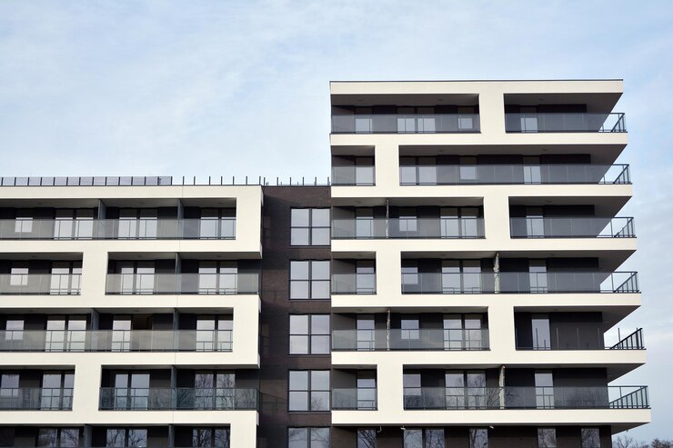 Photo modern apartment buildings on a sunny day with a blue sky