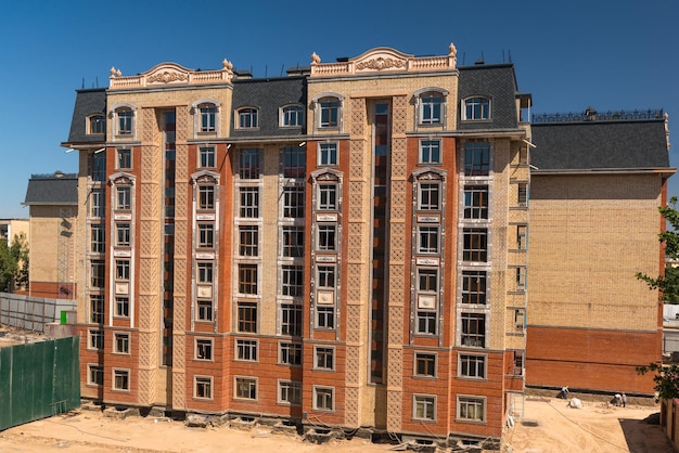 Modern apartment complex design. Building under construction