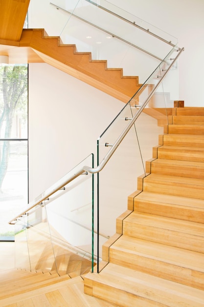 Modern architecture interior with wooden stairs