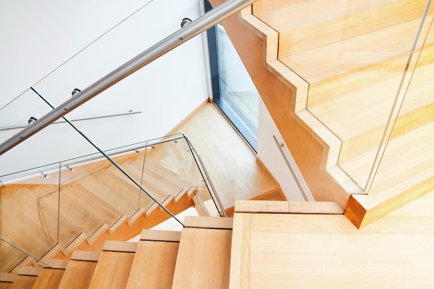 Modern architecture interior with wooden stairs