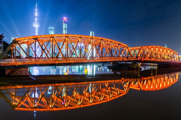 The modern architecture of the outer white cross bridge of Shanghai and Pudong