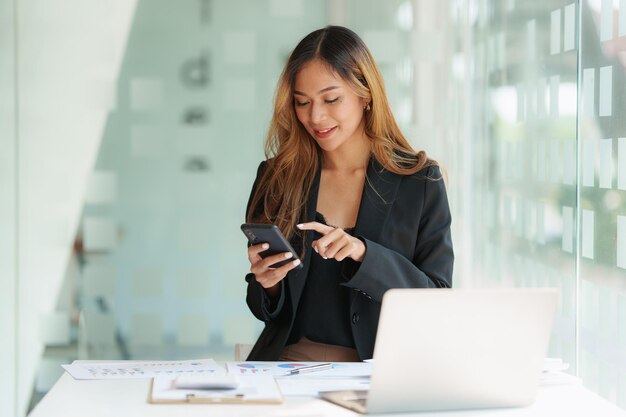 Modern Asian Business woman have confident working with financial at office Accounting concept