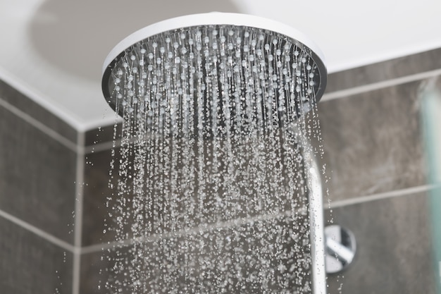 Modern bathroom interior with grey tiles