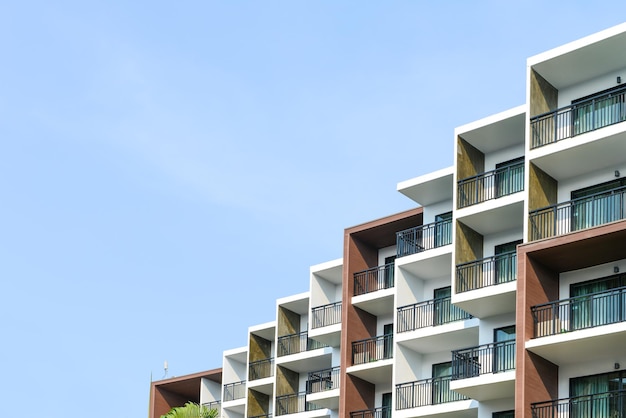 Modern beautiful luxury hotel resort building and blue sky in Pattaya city, Thailand