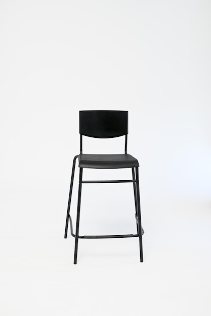 Modern black chair isolated on white Vertical photo