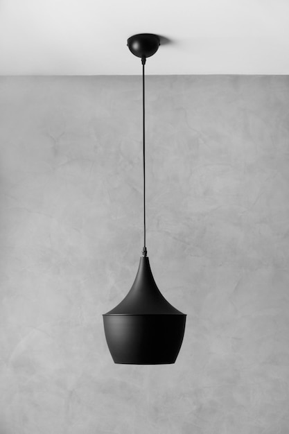 Foto lampadario moderno nero su sfondo grigio