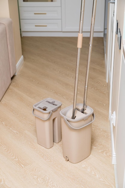 Modern buckets with mops Cleaning of premises