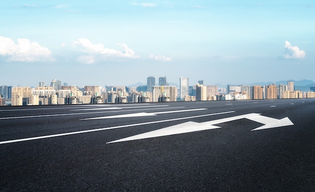 Modern building background and asphalt road in Shanghai, China