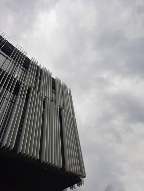 Modern building and cloudy sky