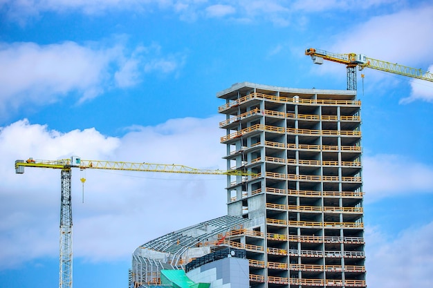 Modern building and the lifting crane