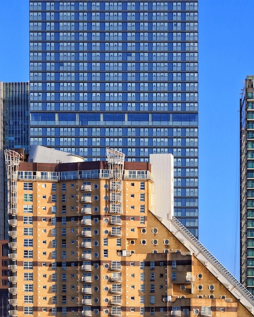 Photo modern buildings against blue sky