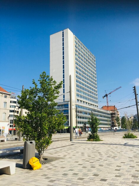 Modern buildings against clear sky in city