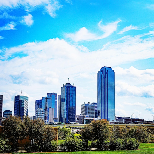 Modern buildings against sky in city