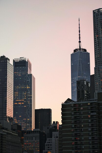 Modern buildings in city against clear sky