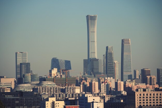 Photo modern buildings in city against clear sky