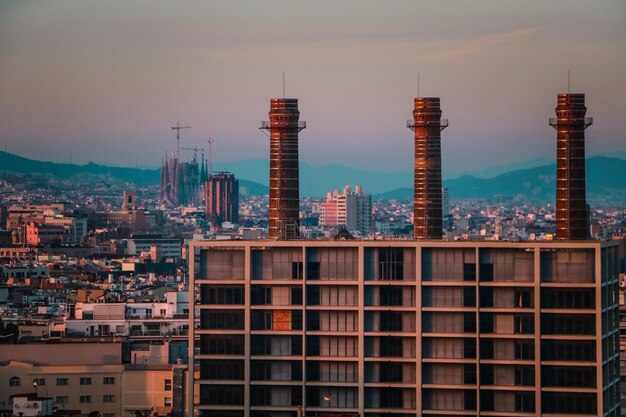 Foto edifici moderni in città contro il cielo durante il tramonto