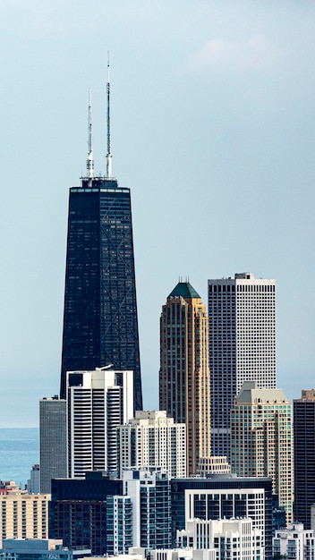 Modern buildings in city against sky