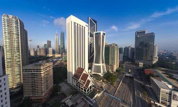 Modern buildings in city against sky