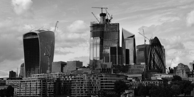 Modern buildings in city against sky