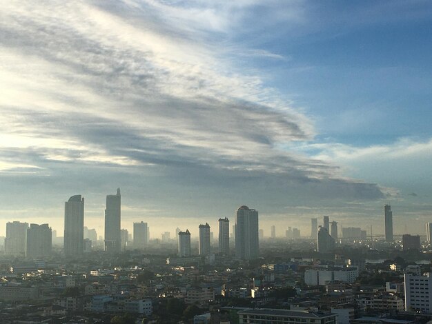 Modern buildings in city against sky