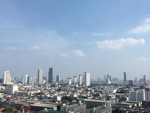 Modern buildings in city against sky