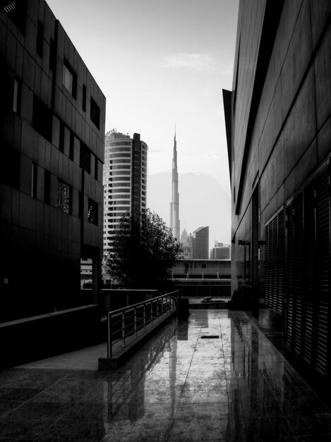 Modern buildings in city against sky