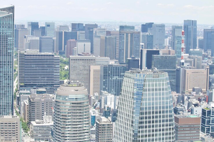 Photo 空に照らされた都市の近代的な建物