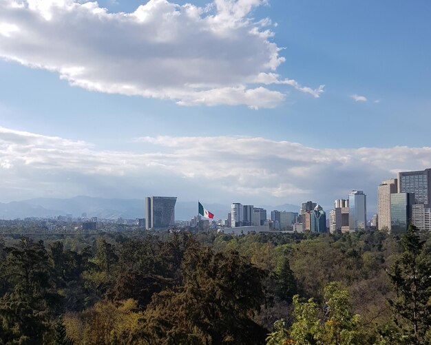 Modern buildings in city against sky