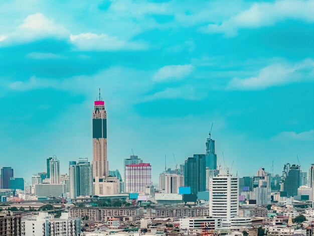 Modern buildings in city against sky