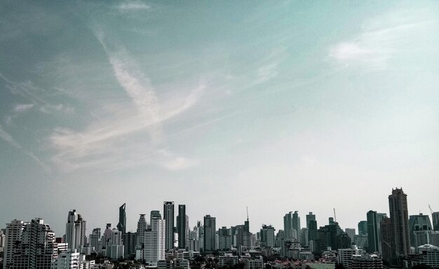 Modern buildings in city against sky