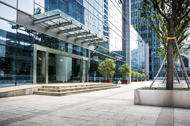 Photo modern buildings and empty pavement in china