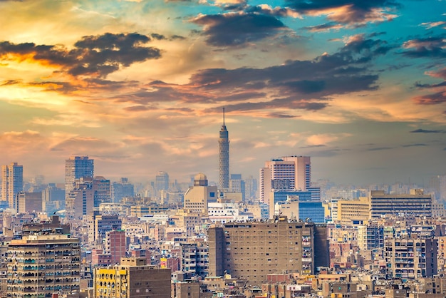 Modern buildings and TV Tower of Cairo at sunset