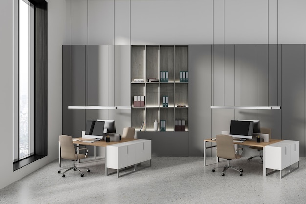modern business interior with pc computer on table shelf with window