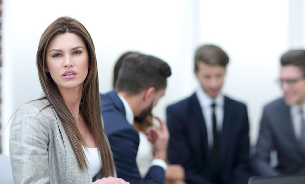 Modern business woman on the background of the office business people