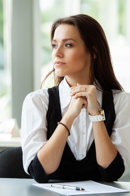 Modern business woman in the office with copy space