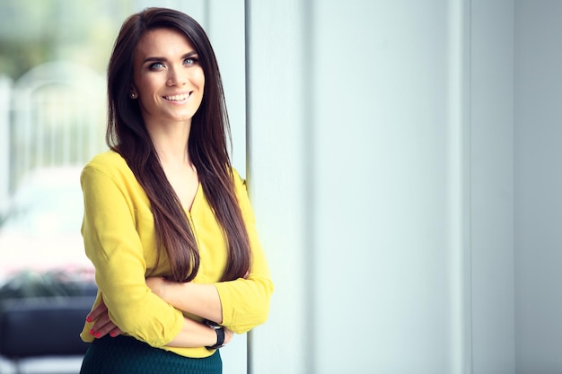 Modern business woman in the office with copy space