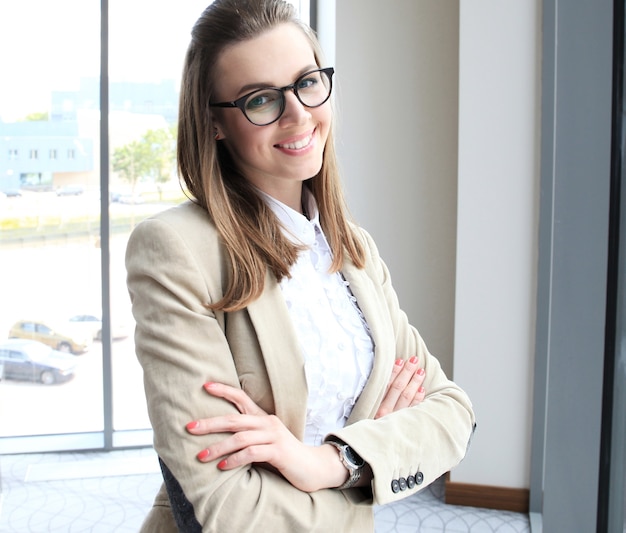 Modern business woman in the office with copy space