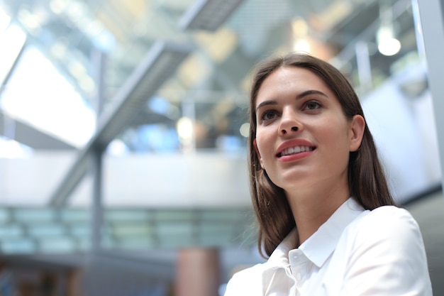 Modern business woman in the office with copy space