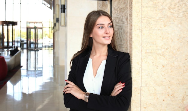 Modern business woman in the office with copy space