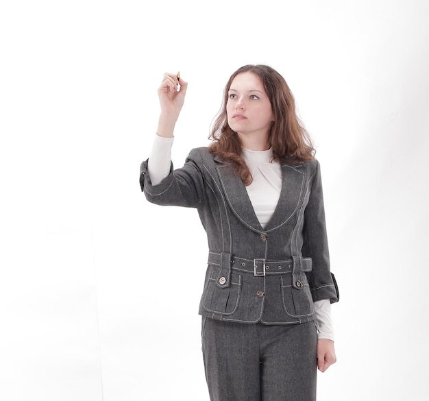 Modern business woman pointing with pen at a virtual point