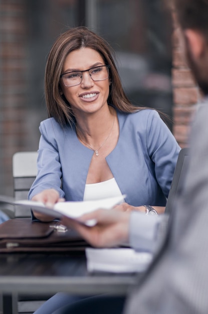 Modern business woman talking to employees business concept