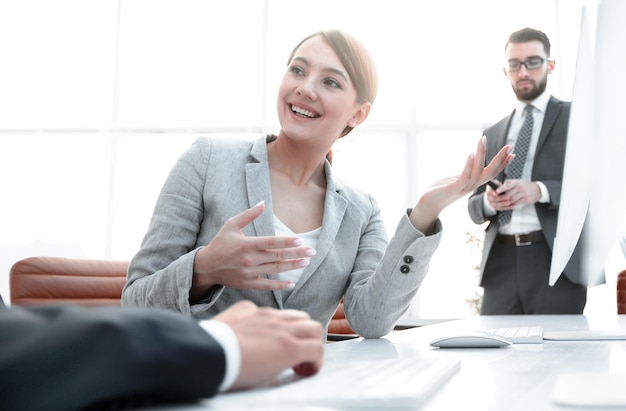 Modern business woman talking with a client